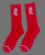 RED SOCKS, WITH WHITE H.F.C LOGO.